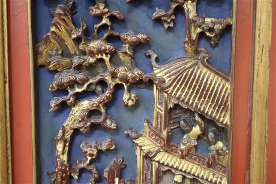 A Chinese gilt and red lacquered relief panel 84 x 32cm